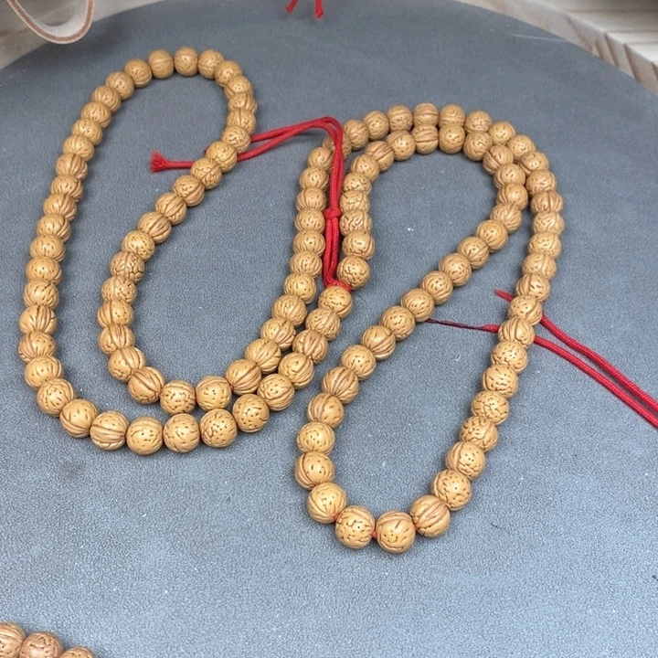 共***梦手串桃核脖挂边尺10.5抛光尺寸误差0.5mm之间