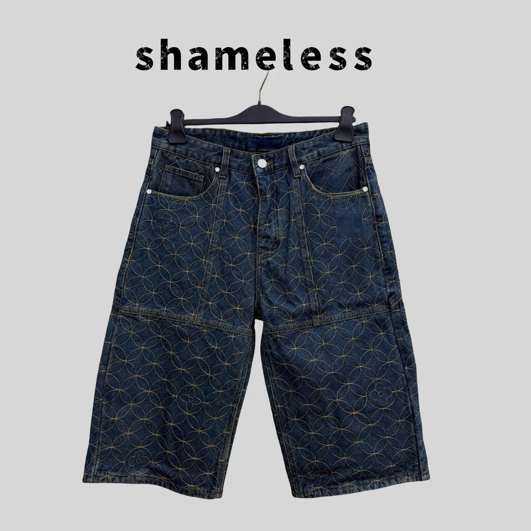 shameless-环圆刺绣工装七分牛仔短裤