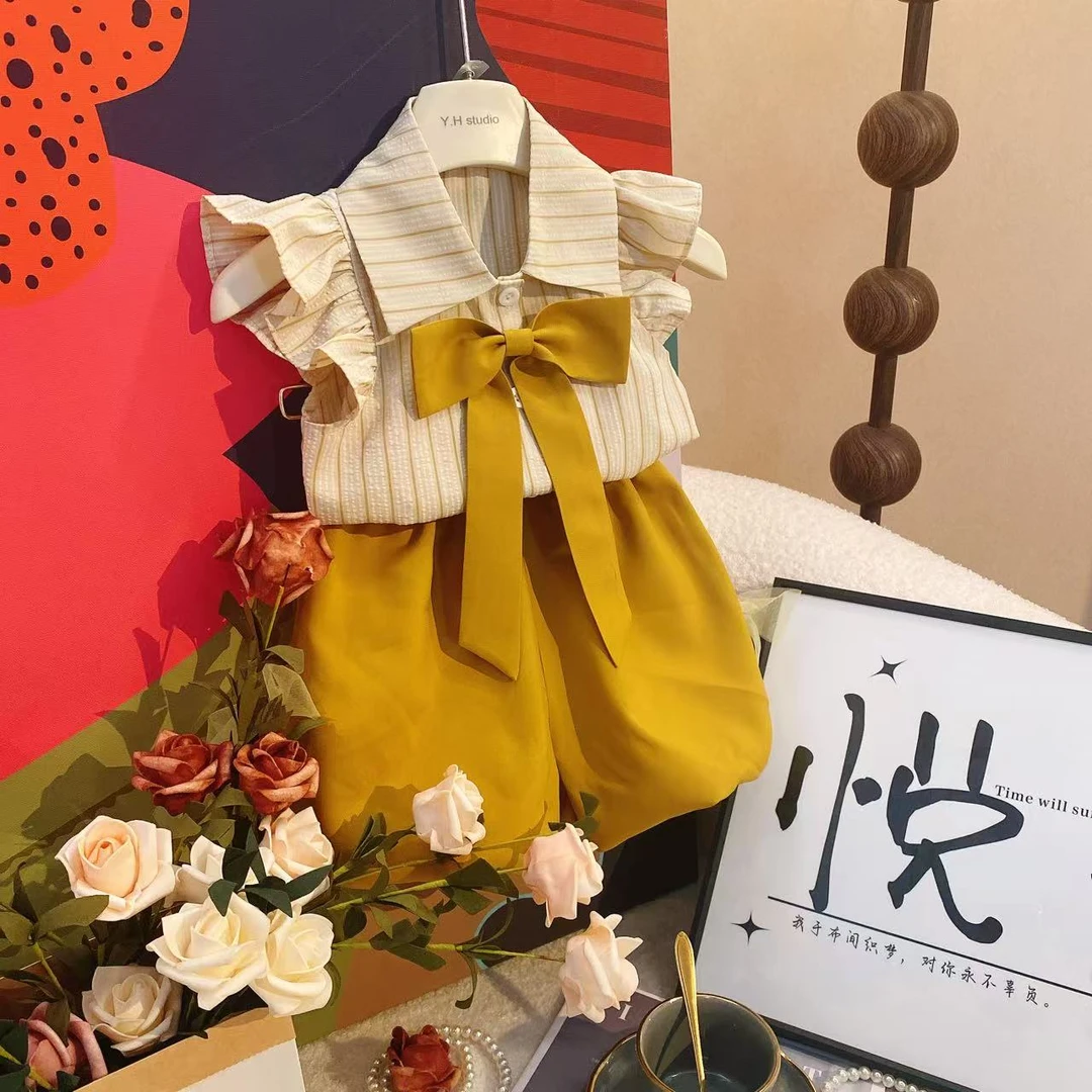T1.2025夏季新蝴蝶结女宝条纹百搭时尚黄色可爱小飞袖套装裙8432