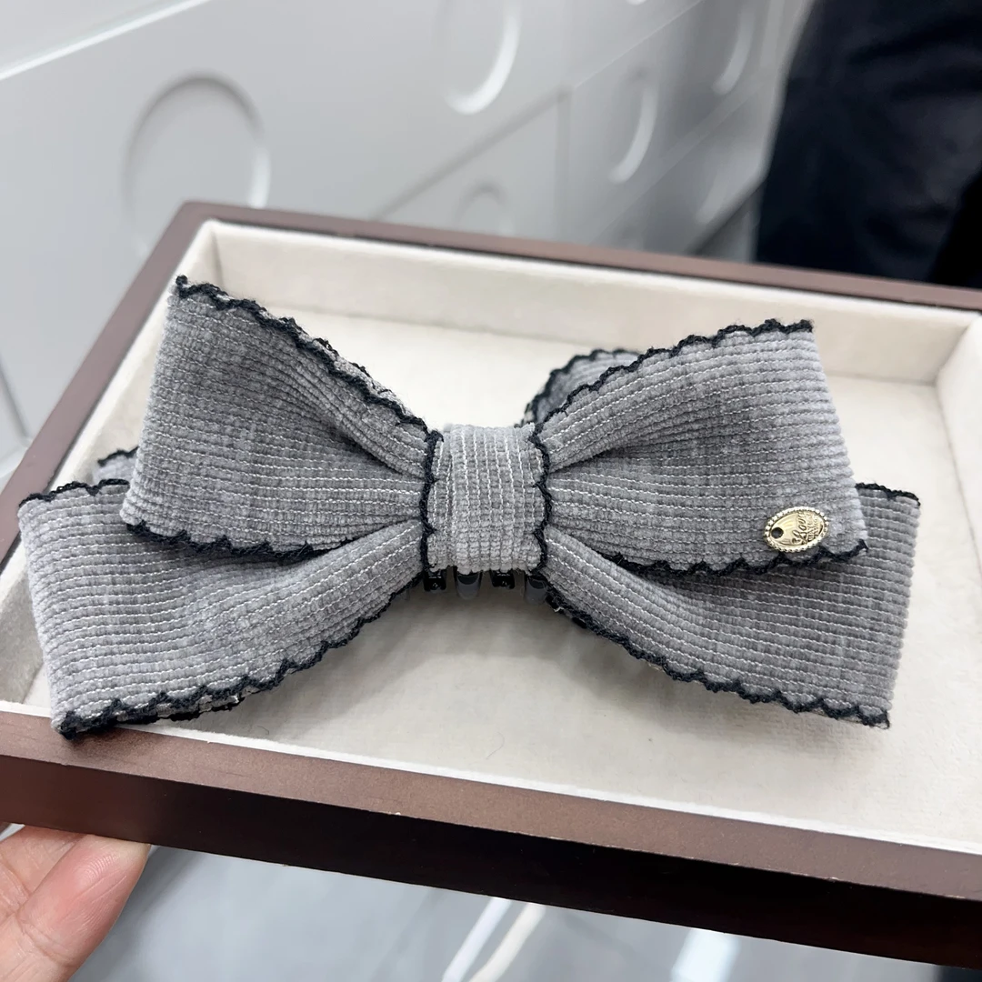 P632高级灰色蝴蝶结香蕉夹