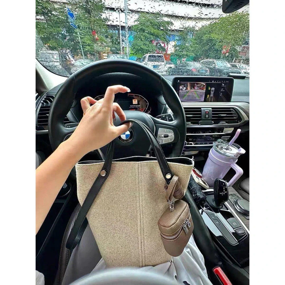 《RT》水桶包包女式2025新款高级感轻奢小众手提单肩亚麻腋下包