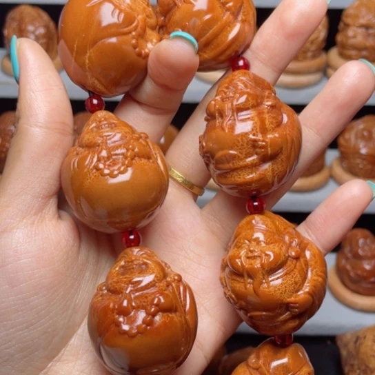 吊坠橄榄核我****？财迷手持3.3