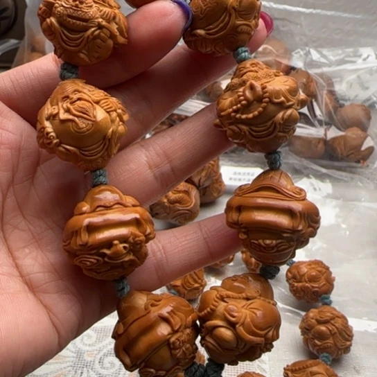 里***予手串橄榄核橄榄雕工艺的