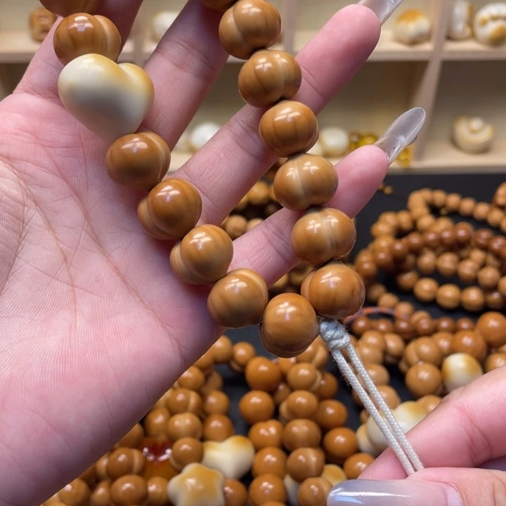 x***手串猴头核桃微瑕屁桃加爱心