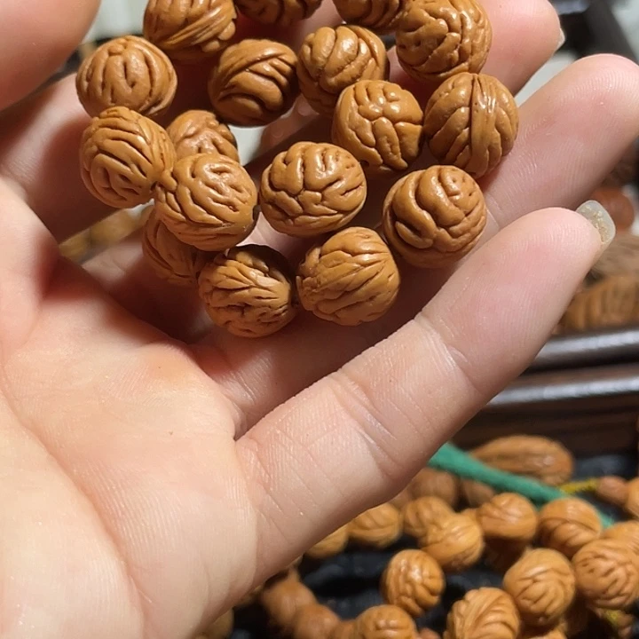 凯***饮碧桃核肌肉纹手串