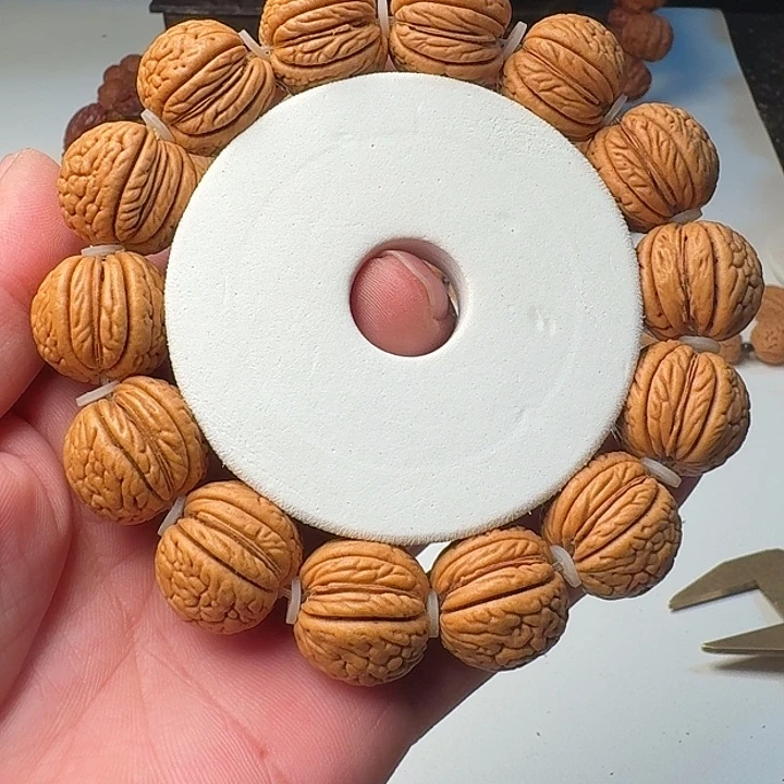 吊坠桃核虎过庄肌肉