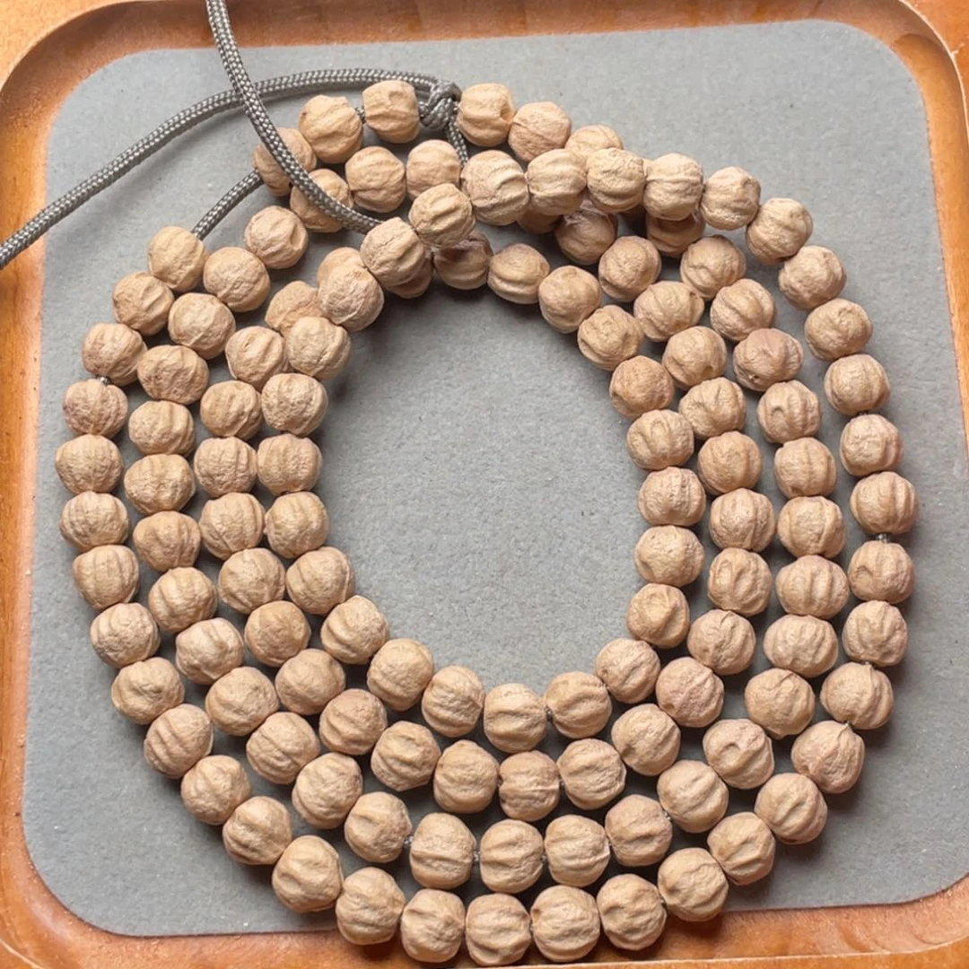 领***悟柏香籽/百香籽吊坠 玉化皮 龙脊 莲花 原桩 7+mm左右