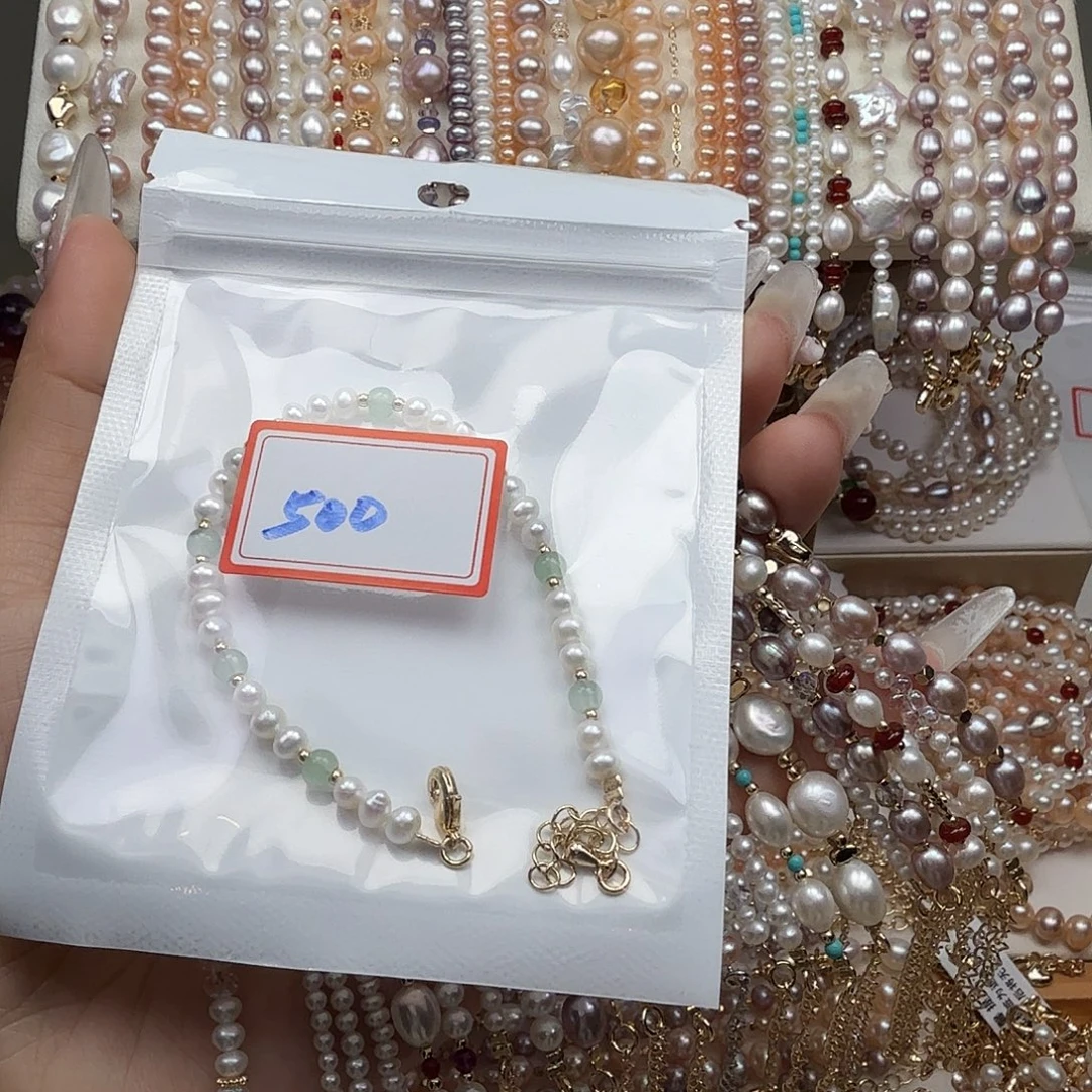 啊***欧淡水珍珠钛钢手绳