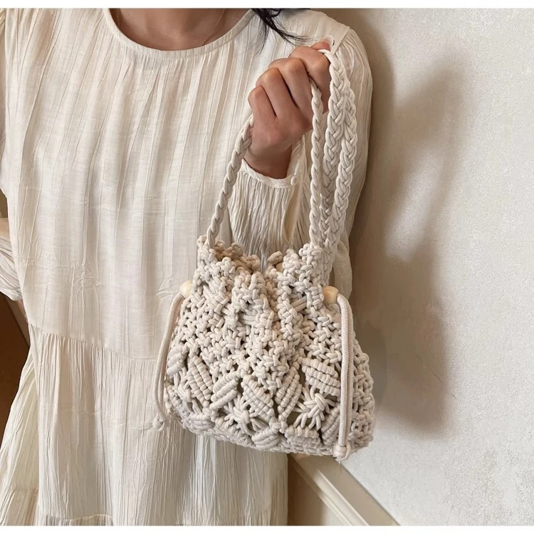 小众设计编织草编包包女2025新款海边度假沙滩包福袋斜挎水桶包女