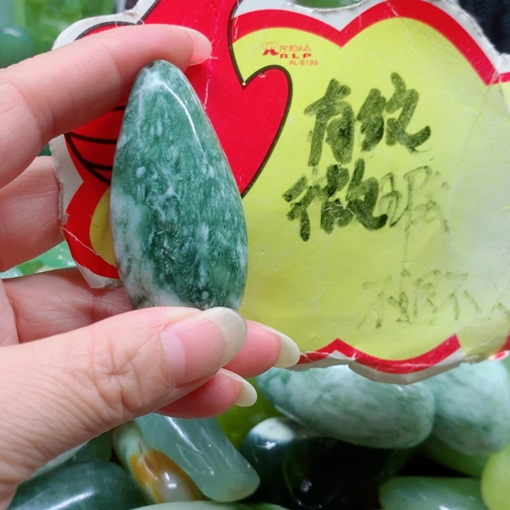 未镶嵌蛇纹石玉手把件
