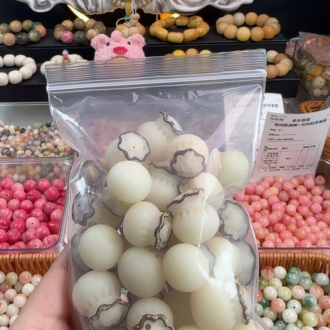 爱***粥菩提根/象牙果手串瑕疵卡20大钱袋34个