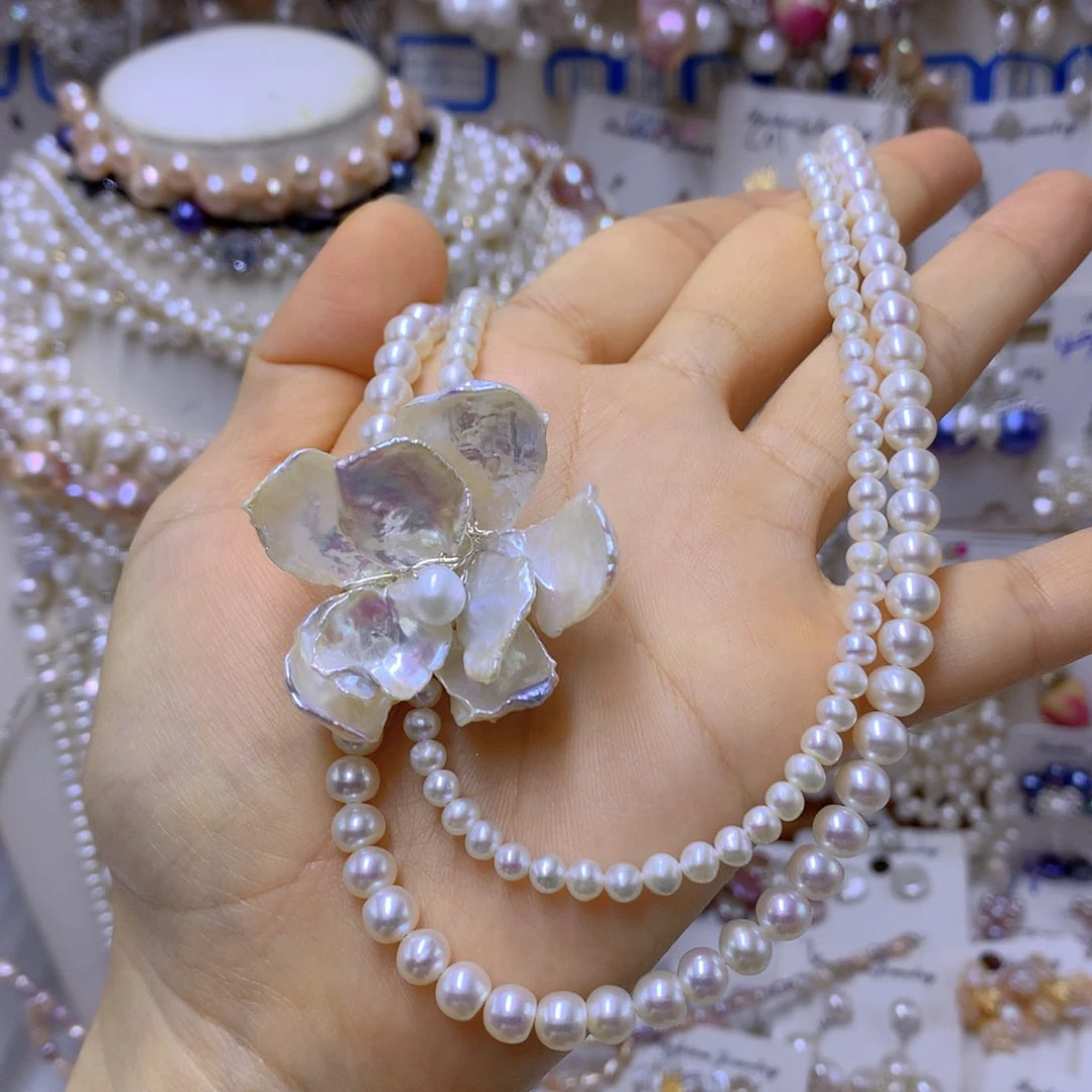 合金淡水珍珠耳饰哈*