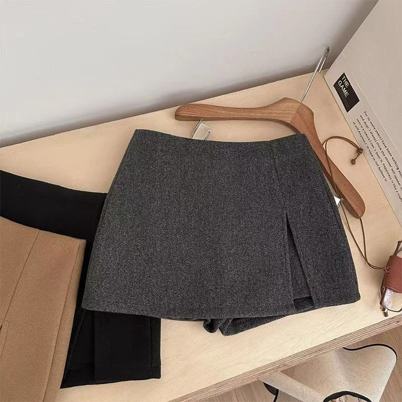 秋冬毛呢A字短裙女时尚设计感2025不规则高腰显瘦开叉短裙学院风