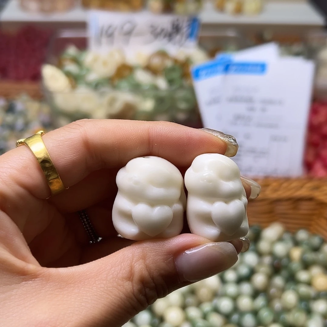 菩提根/象牙果手串瑕疵白爱心兔3颗孔道有裂