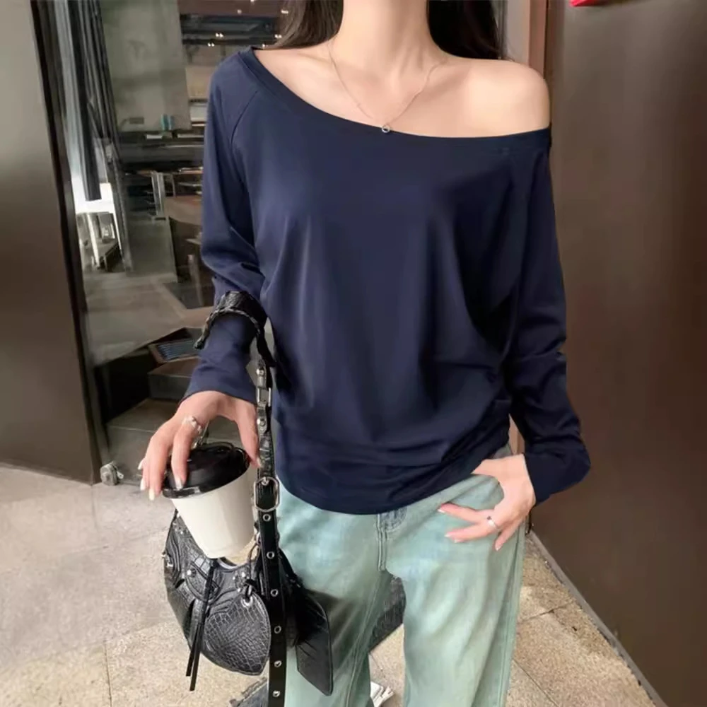 纯欲一字肩白色斜角肩长袖T恤女宽松打底衫慵懒别致绝美上衣百搭