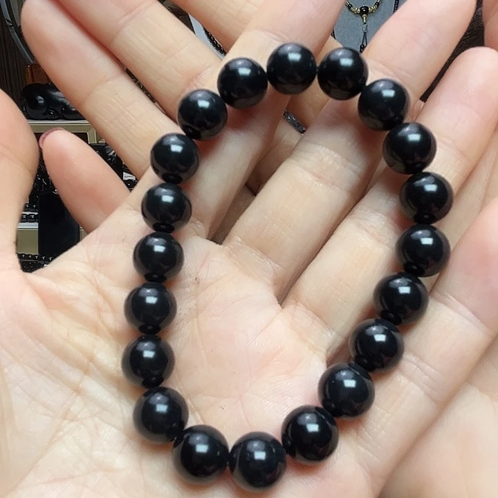 蓝***堂和田玉（墨玉）未镶嵌吊坠(赠链)卡10圆珠高羊脂