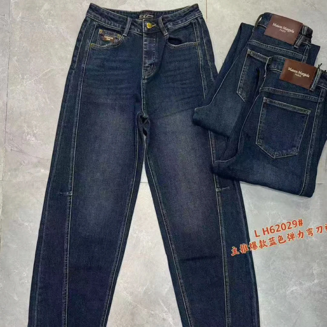 秋季新款高腰宽松弯刀牛仔裤时尚百搭显瘦水洗镰刀裤