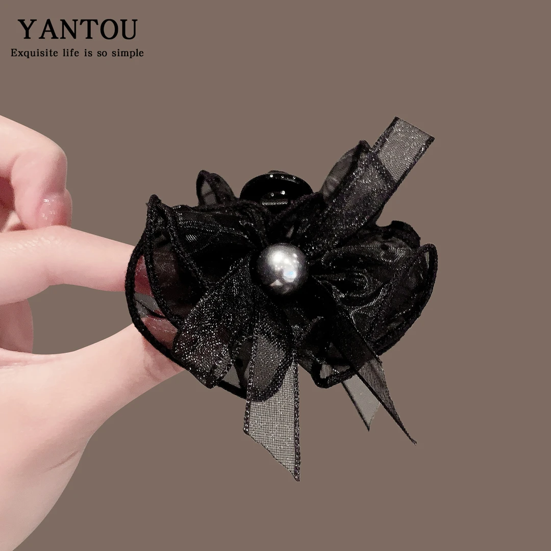 韩系小众珍珠网纱蝴蝶结抓夹女高级感后脑勺盘发鲨鱼夹子百搭头饰