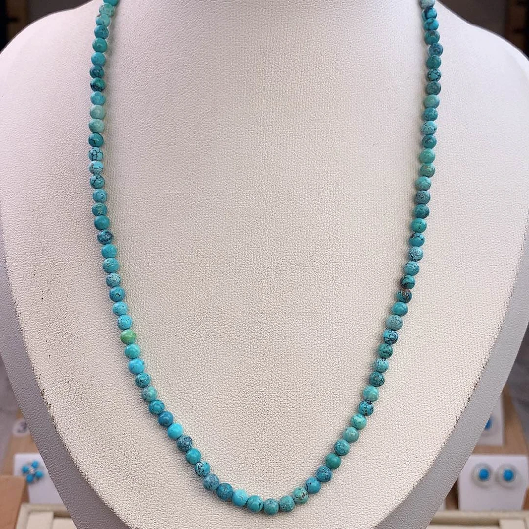 绿松石未镶嵌颈饰媛****?