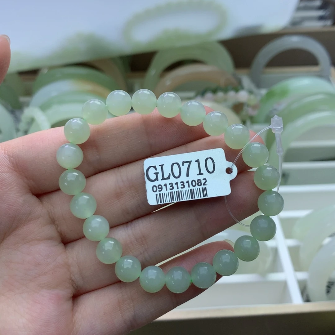 和田玉手镯未镶嵌桃****?