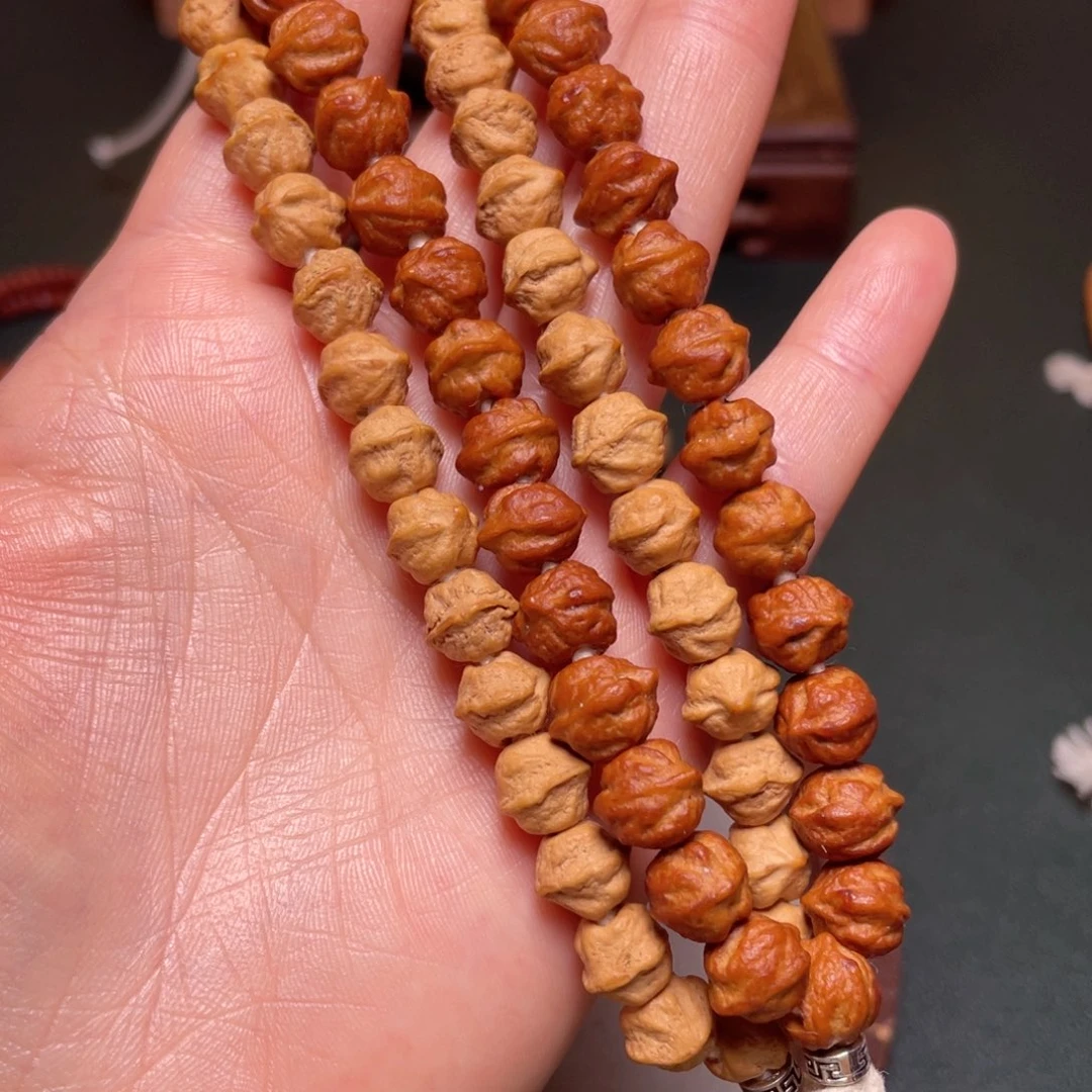 吊坠柏香籽/百香籽白牙横打手持