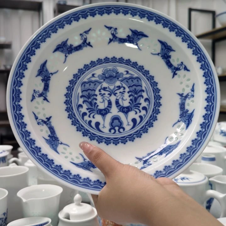 瓷孔雀10寸折边窝盘一个