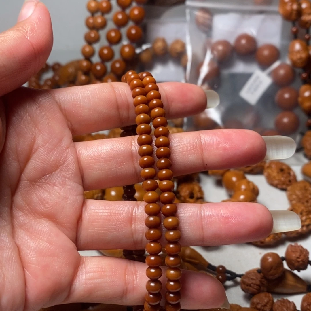 ****好橄榄核吊坠算盘珠