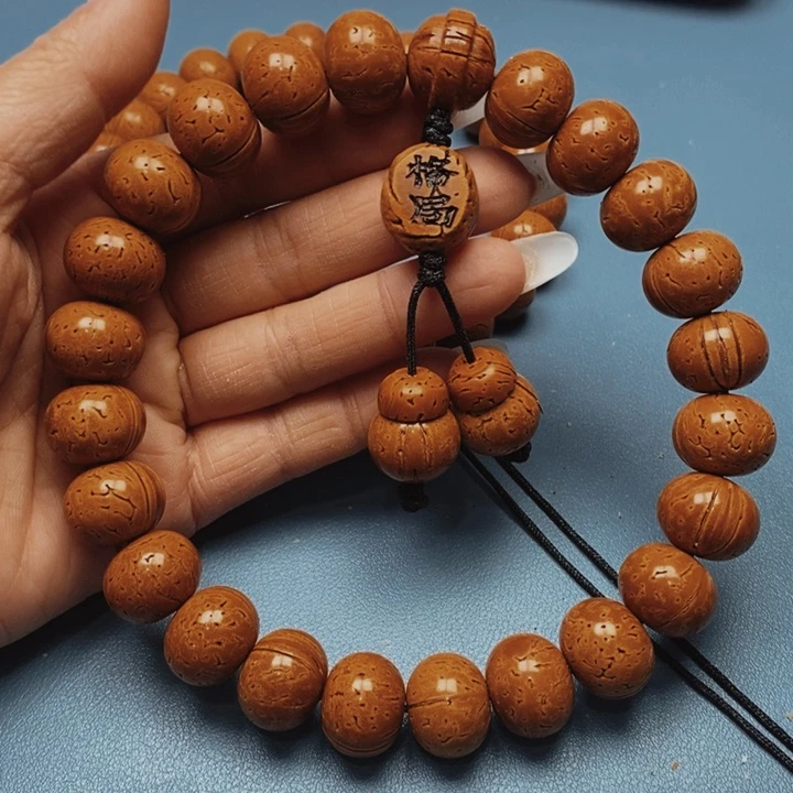 桃核手持算盘17花皮色差21颗