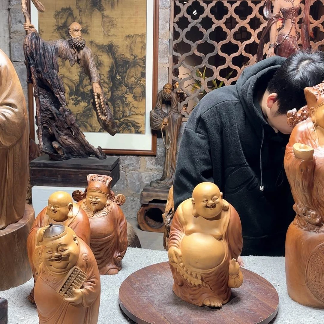 香樟木l****2香樟木雕弥勒