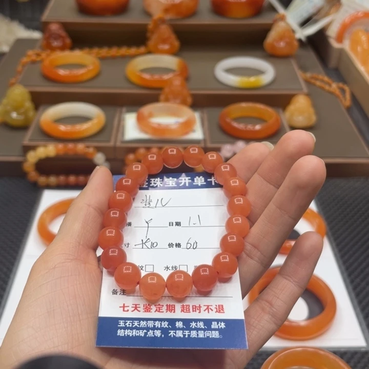 斐***儿石英质玉（黄龙玉）合金手镯