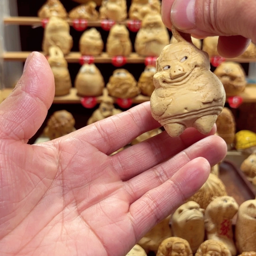 竹竹根雕小猪手把件