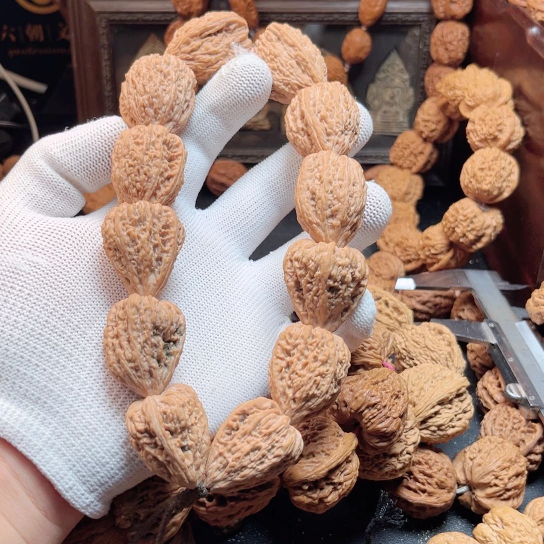 桃核手串辉*噢塔尖核桃