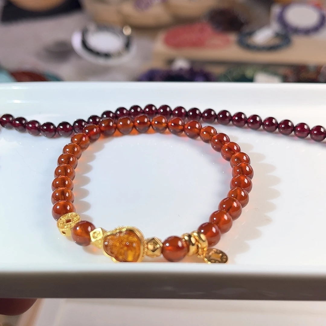 水晶手链未镶嵌鸽*^酒红石榴石5.6设计款15手围 不退换