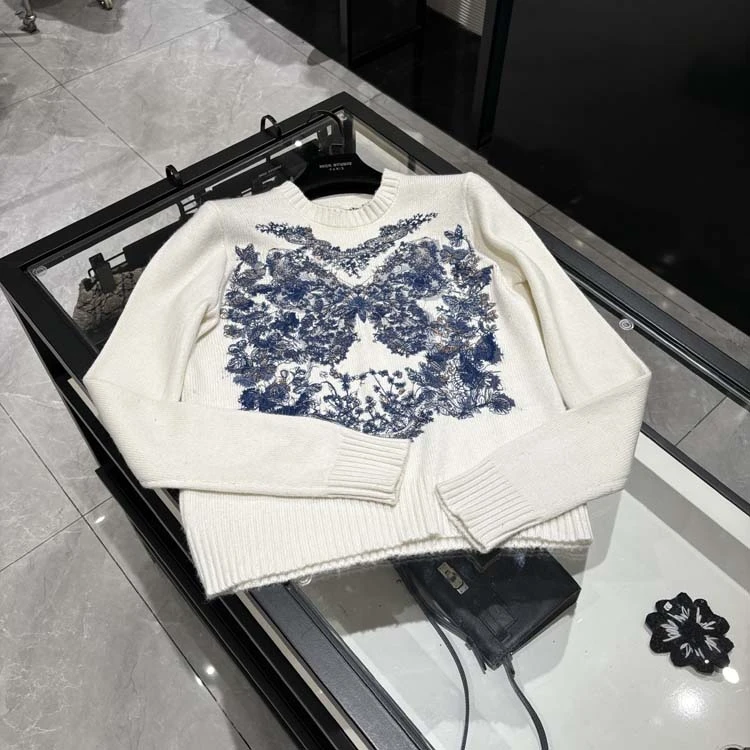 25年春装新款女装 时尚蓝色蝴蝶提花毛衣