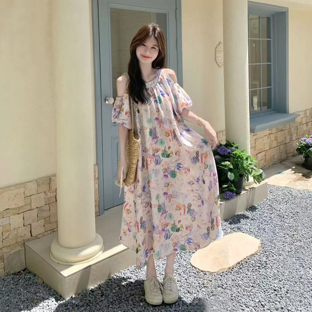 韩系甜美减龄超好看连衣裙女2025夏新款独特漂亮涂鸦露肩A字长裙