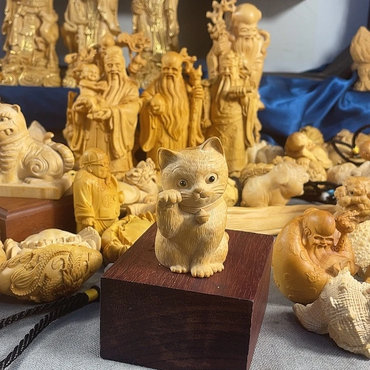 黄杨木招财猫手把件