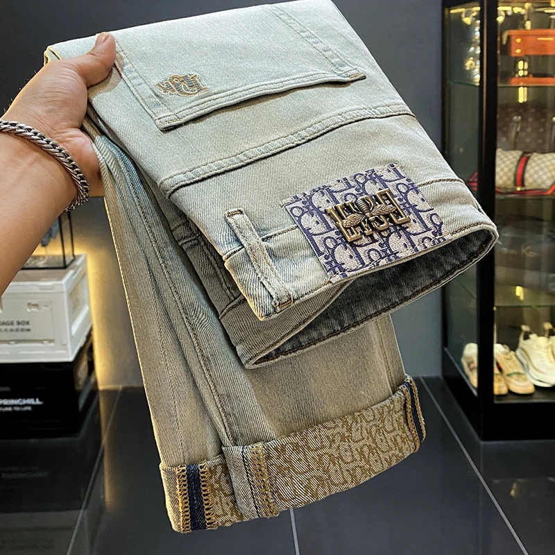 罗尔基那斯高端潮牌修身牛仔裤男士九分新款秋冬小脚休闲痞帅长裤