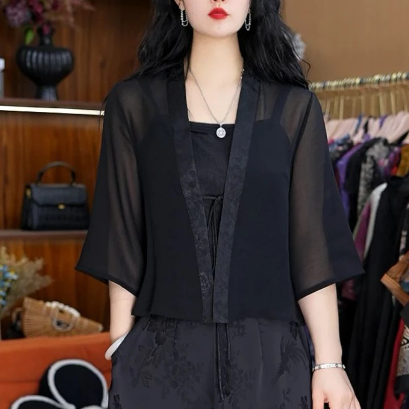 9335-34新款女士外披小衫