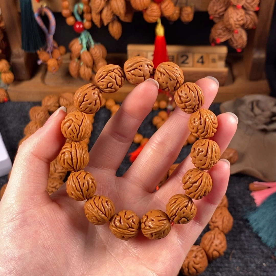 吊坠桃核桃枭手串