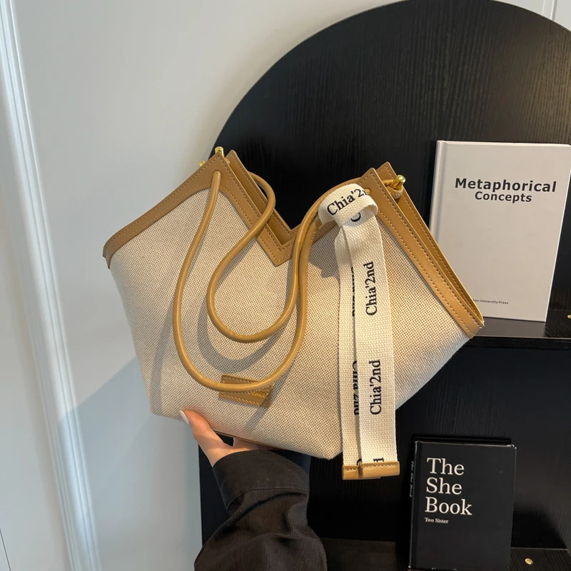 帆布包包女大容量2025新款小众单肩包百搭质感上课通勤托特包