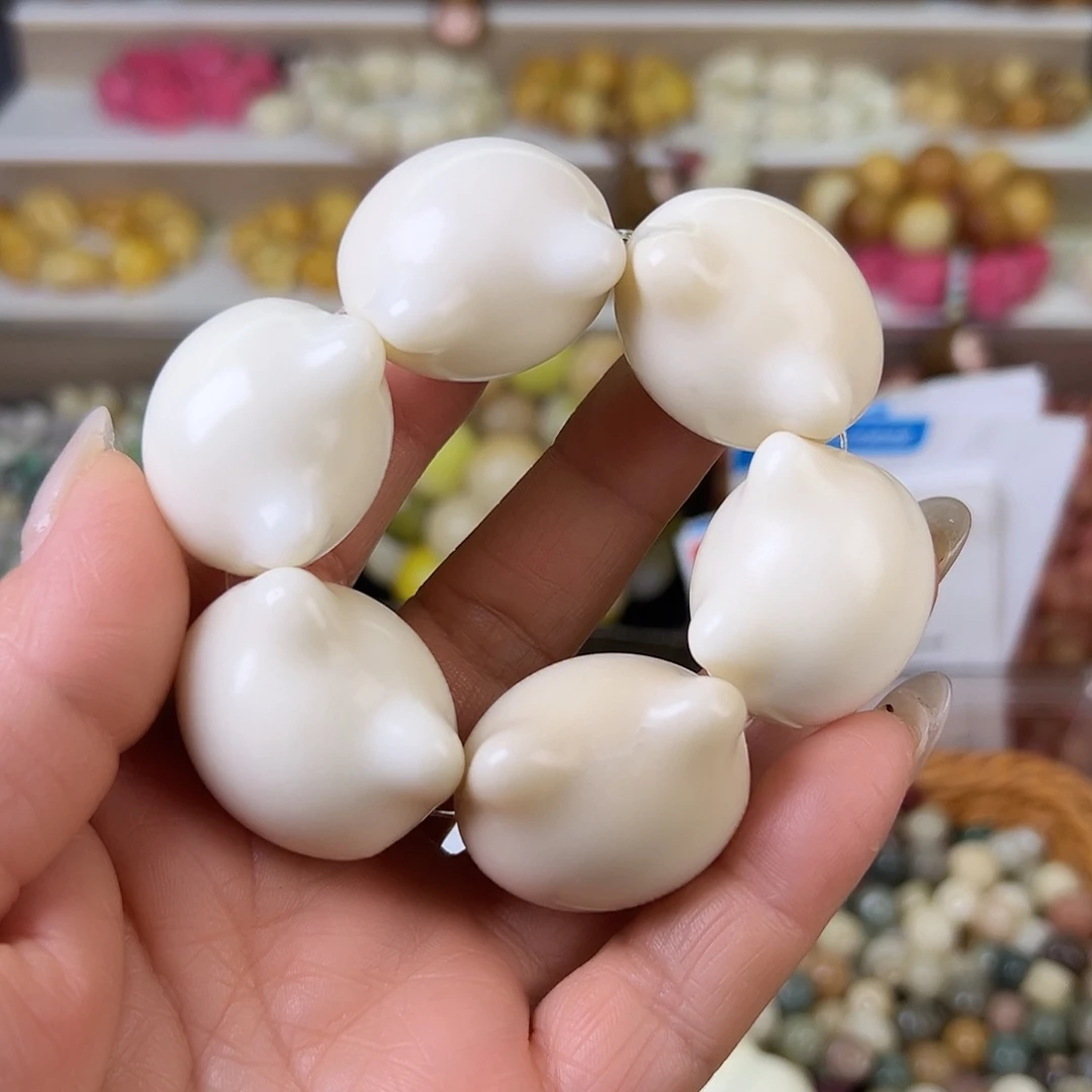 菩提根/象牙果吊坠瑕疵白猫头手捻1个孔道有裂