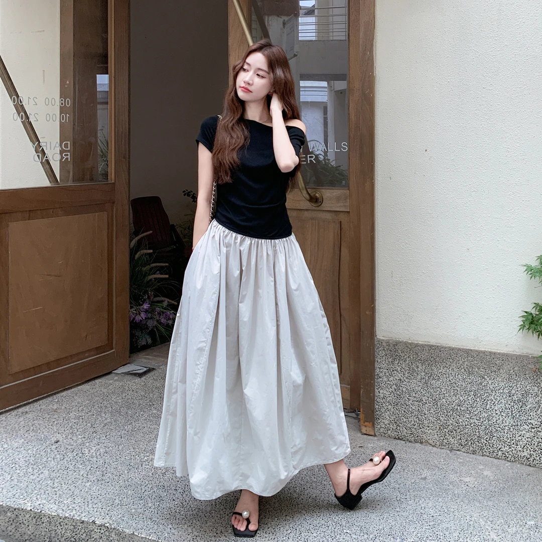 黑拼色性感气质赫本风露肩连衣裙女2025夏季新款假两件收腰A字裙