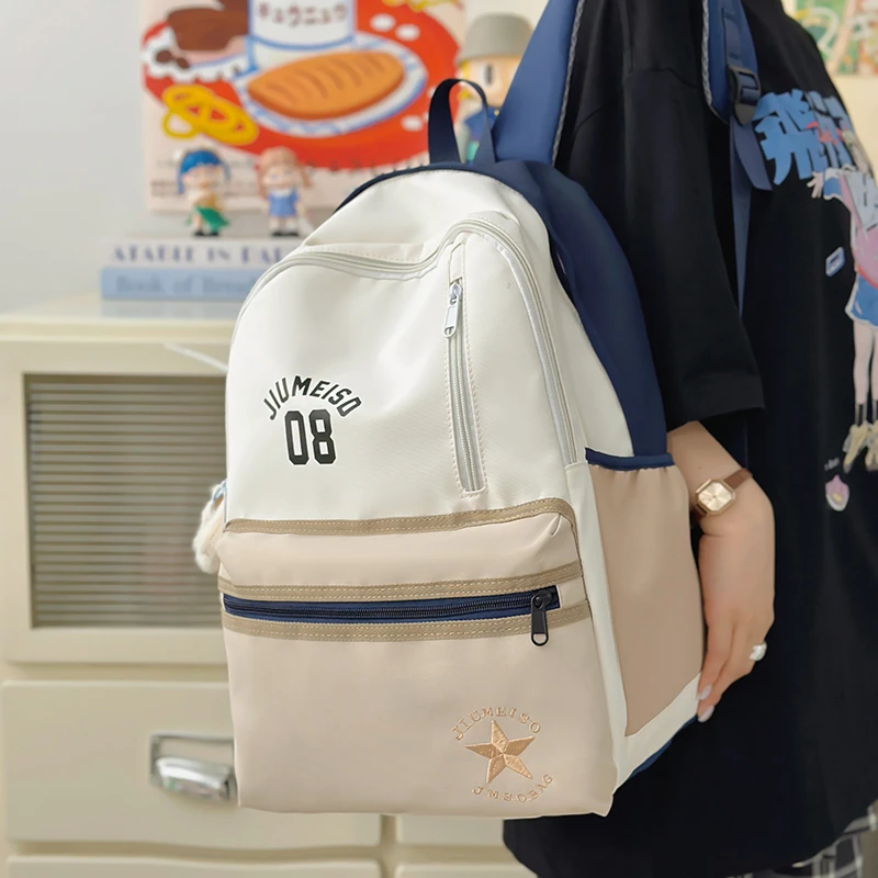 威学生书包运动户外韩版双肩背包包潮流