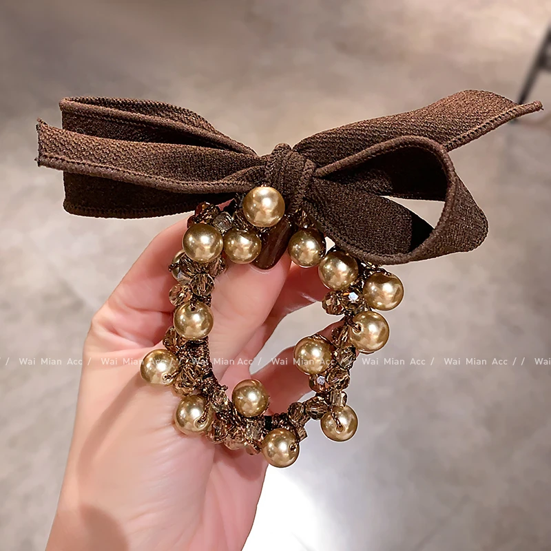 秋冬新款香槟色珍珠发圈女高级感水晶蝴蝶结扎丸子头绳马尾头饰