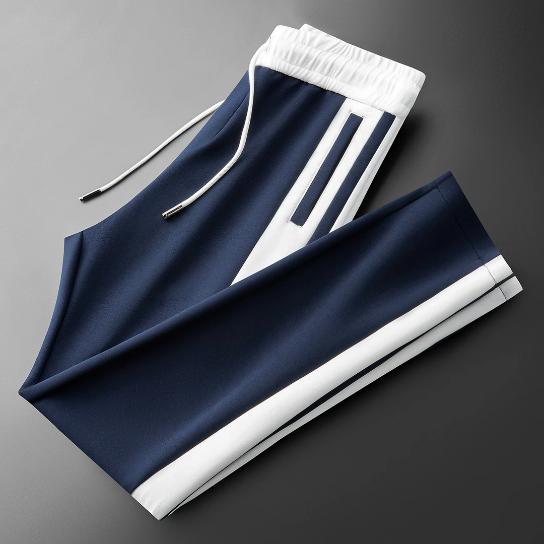 秋季时尚百搭运动卫裤撞色拼接面膜空气层太空棉男士直筒休闲裤男