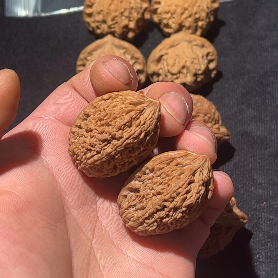 ****指文玩核桃吊坠蒜头