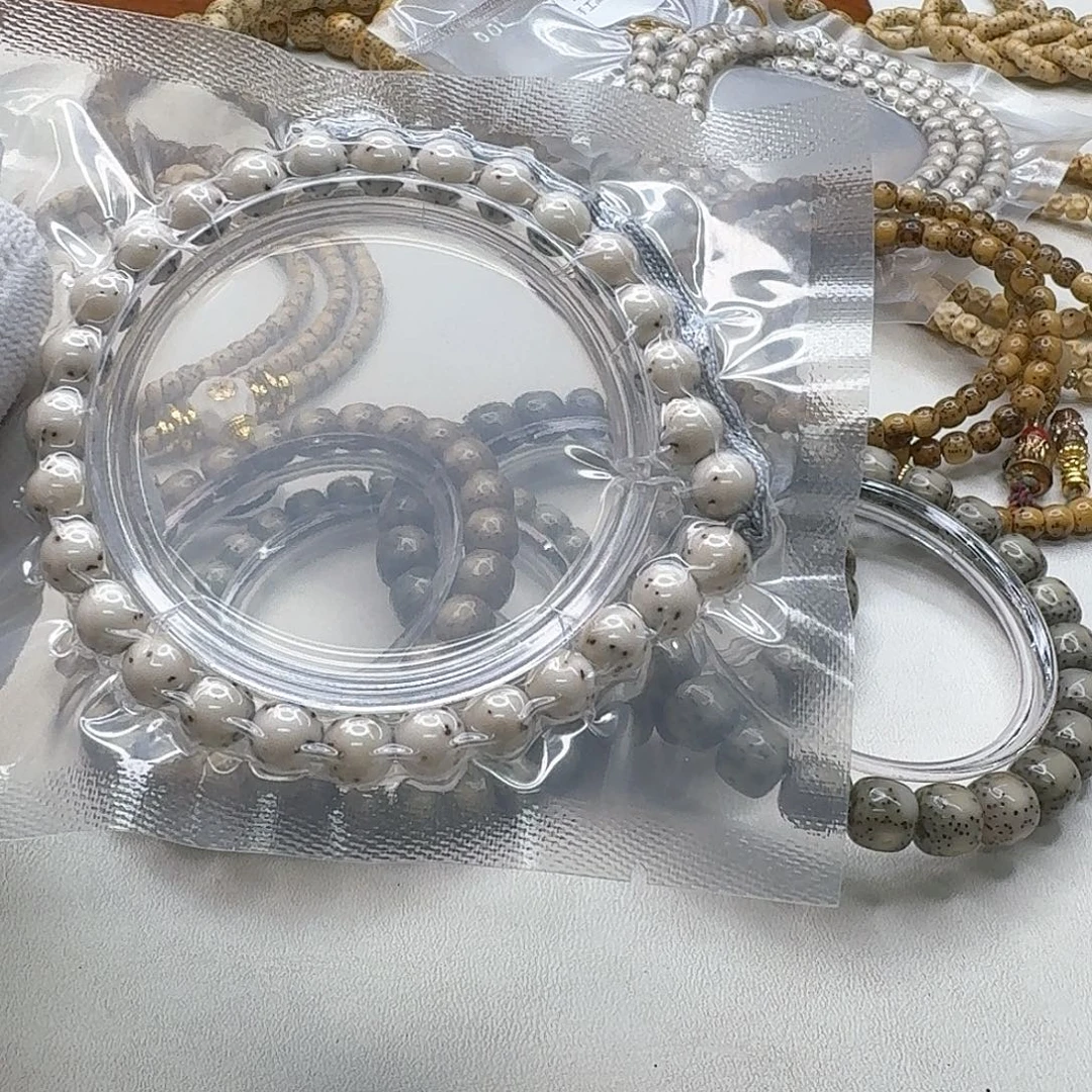 星月菩提吊坠20梵天头条冰白通体龙蛋8圆手持一物一图