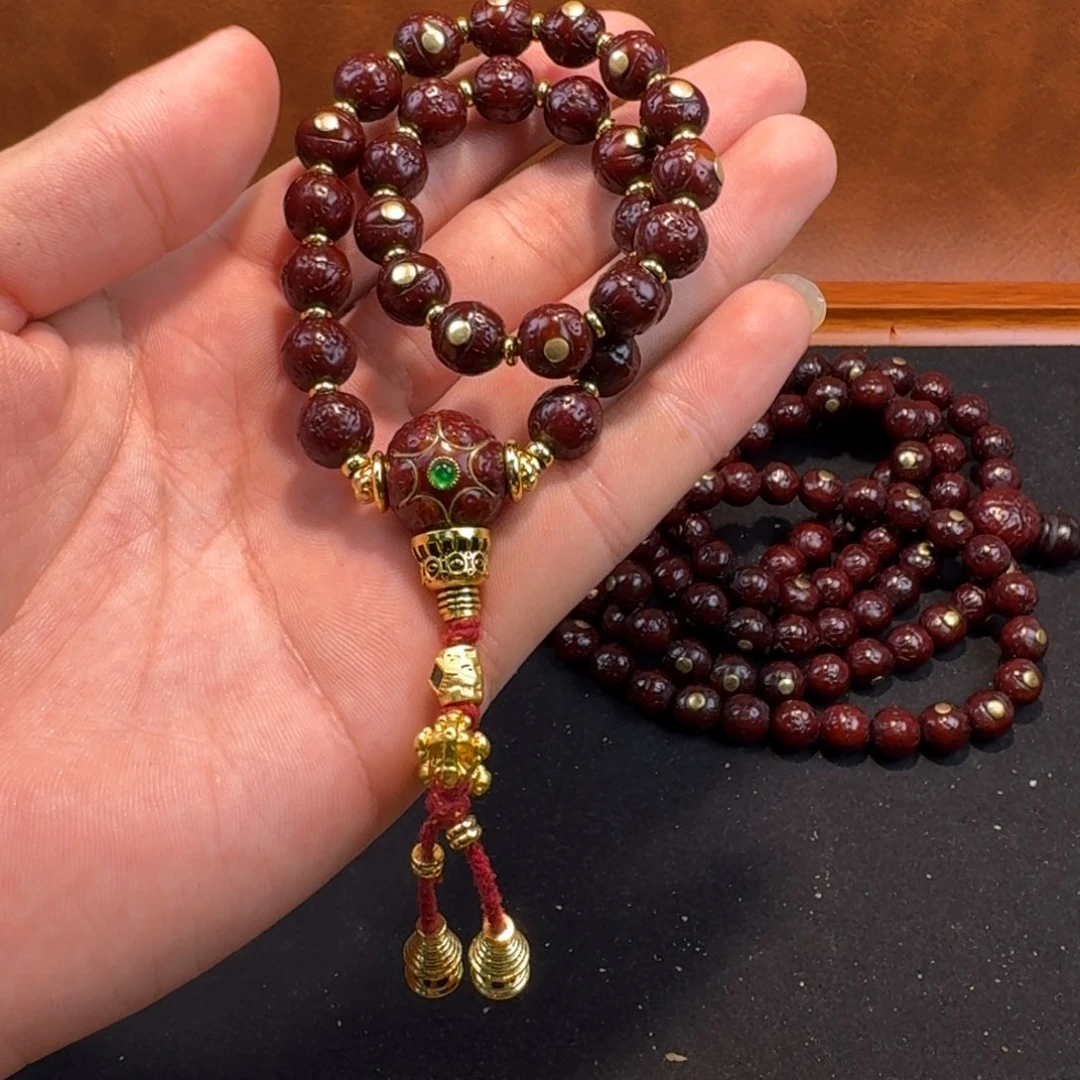 鑫***盛凤眼菩提吊坠手持镶嵌9+