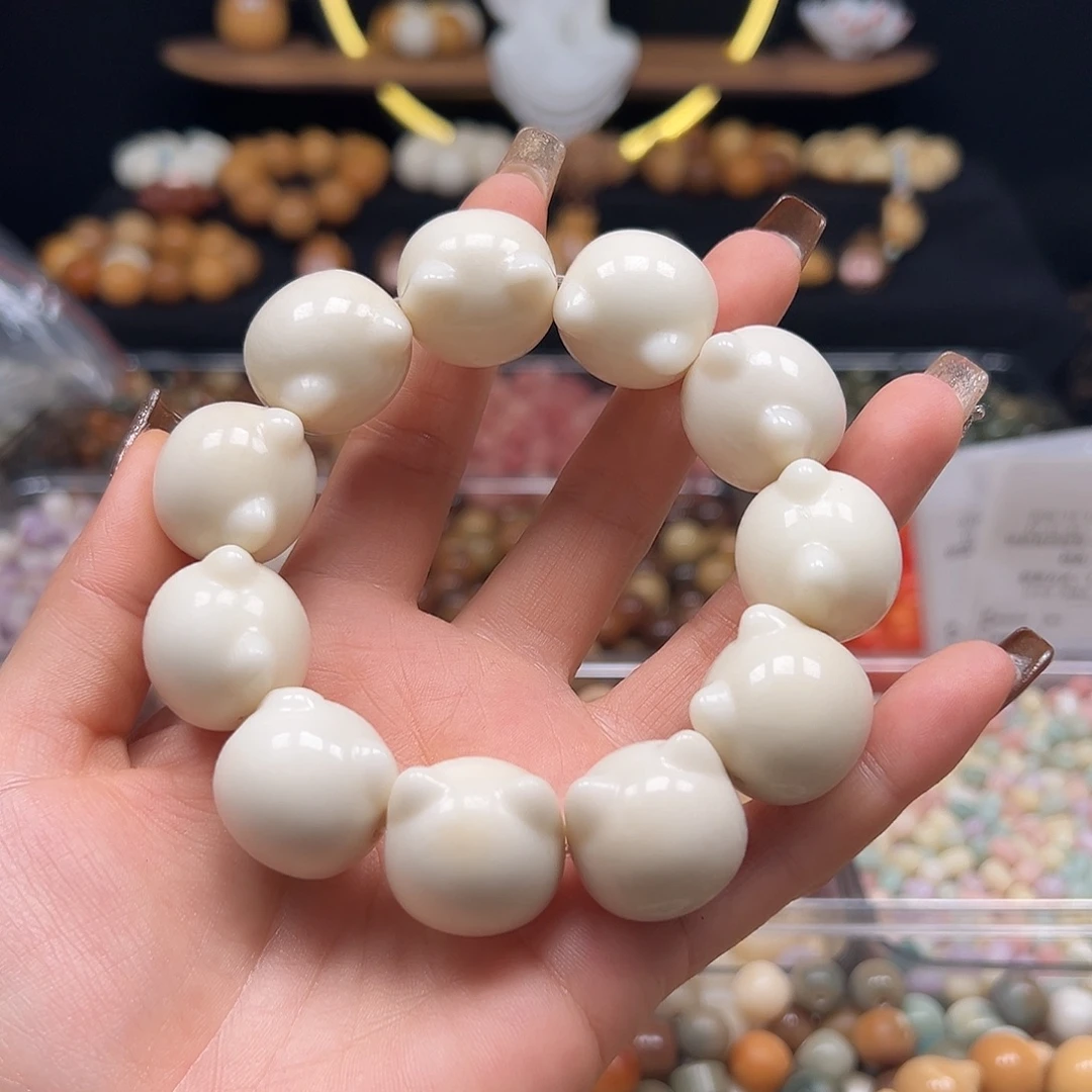 菩提根/象牙果手串瑕疵白猫头11颗1条有裂