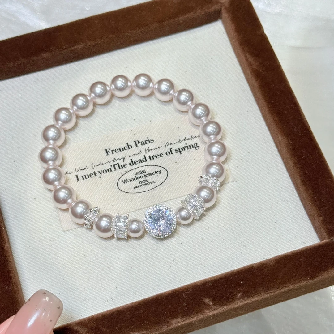 925银仿珍珠手链 925银仿珍珠手链正圆曼塔玫瑰色施家冰轮手链